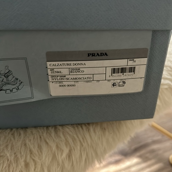 Prada sneakers It has a couple of little spots on it that’s cleanable. - Picture 6 of 12